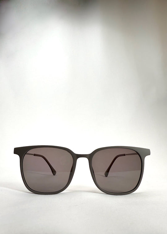 Front view of Achernar khaki brown titanium sunglasses with UV400 polarized lenses for premium eye protection.