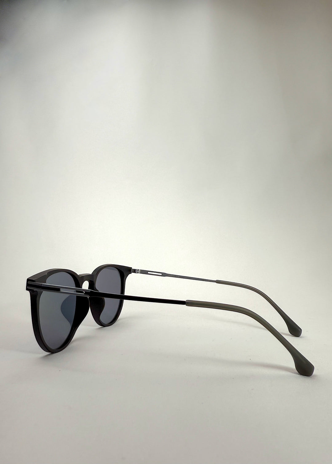 Side view of Altair matte black titanium sunglasses showcasing the ultra-light frame.