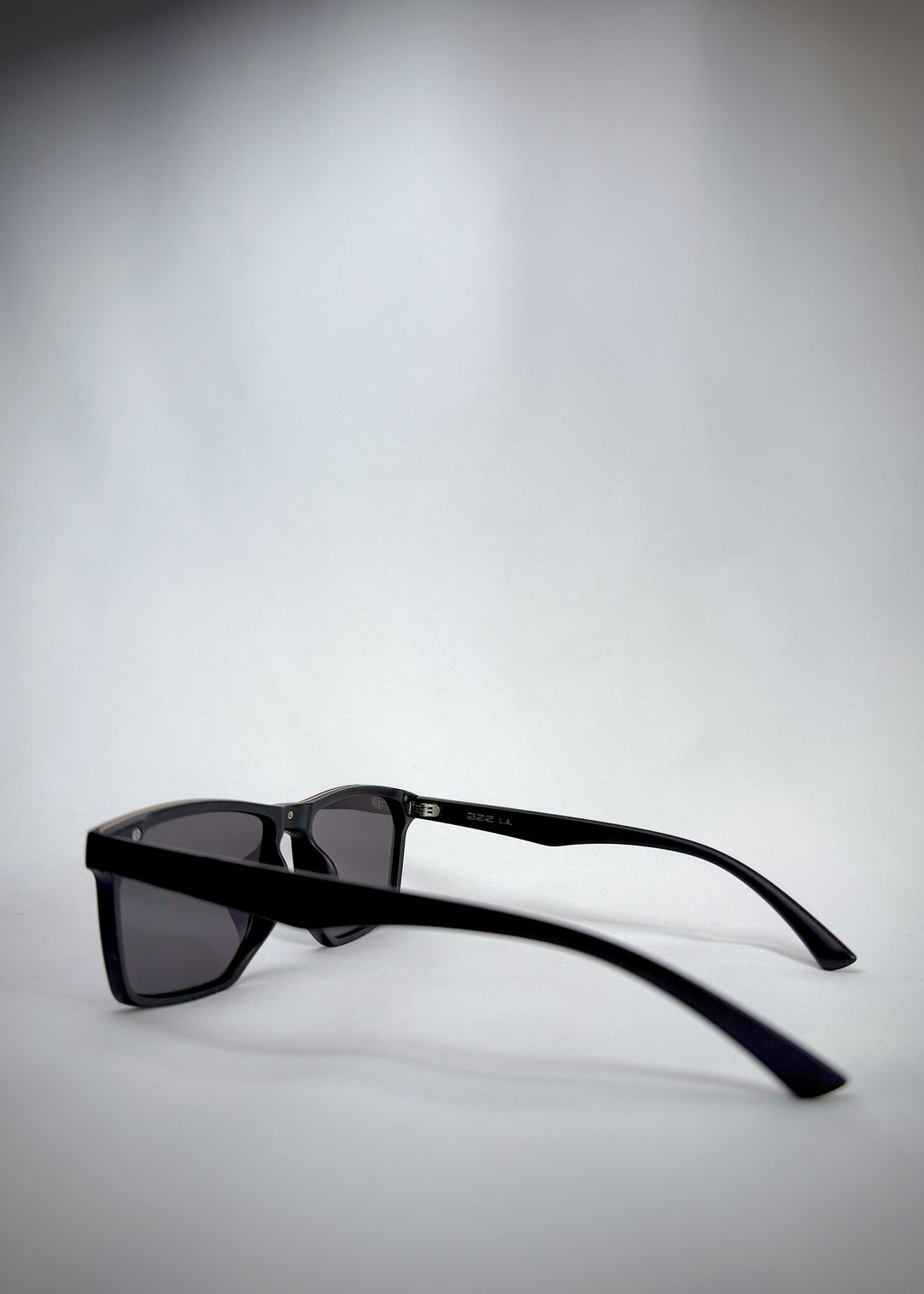 Side view of Betelgeuse matte black sunglasses – Sleek TR90 frame with durable, lightweight design.