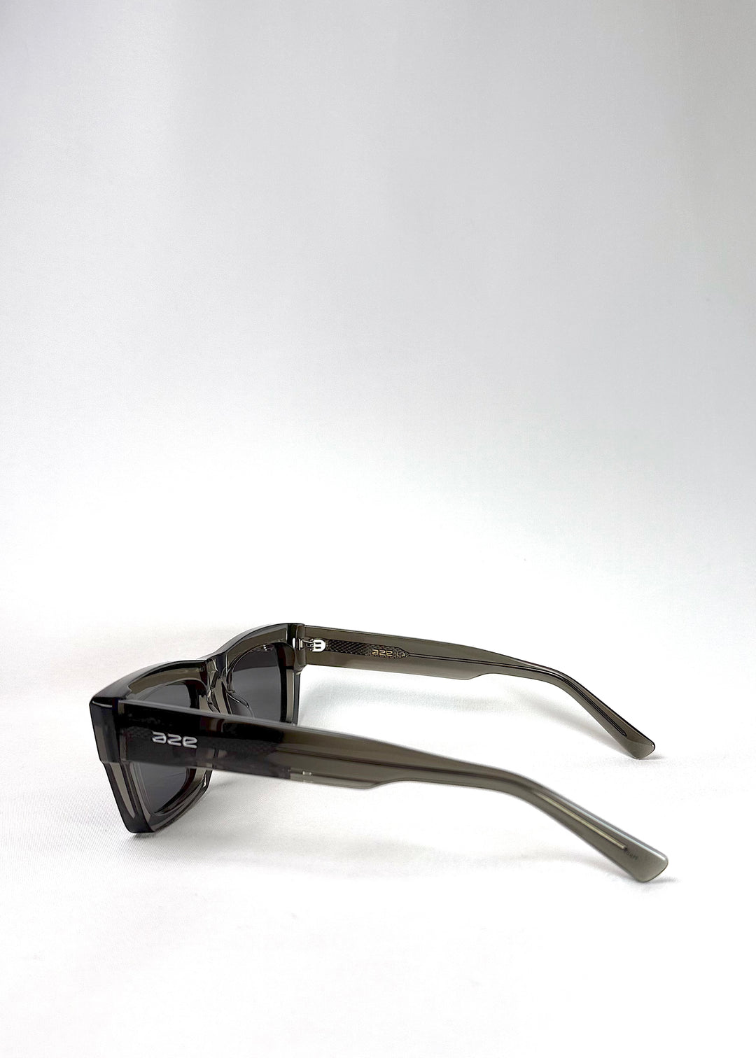 Side view of Fomalhaut gray-green acetate sunglasses showcasing frame structure and lens clarity.