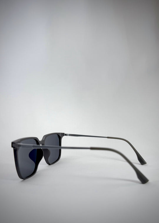 Side view of Gemini Matte Gray sunglasses, featuring the slim, ergonomic titanium frame.
