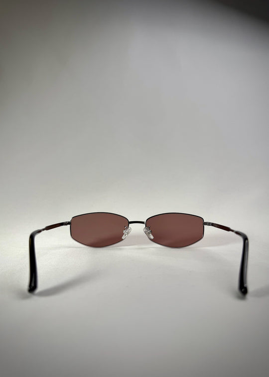 Back view of Sirius B Gunmetal Amber sunglasses – Sleek stainless steel frame with warm amber-tinted lenses for a refined look.