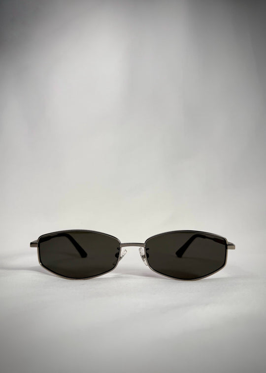 Front view of Sirius B Gunmetal stainless steel sunglasses with green lenses – a modern, lightweight design for everyday sophistication.