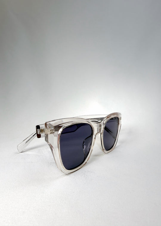 Front angle view of the Veyron sunglasses in Crystal Static, highlighting the sharp, crystalline edges and modern contrast of the slate-blue lenses.