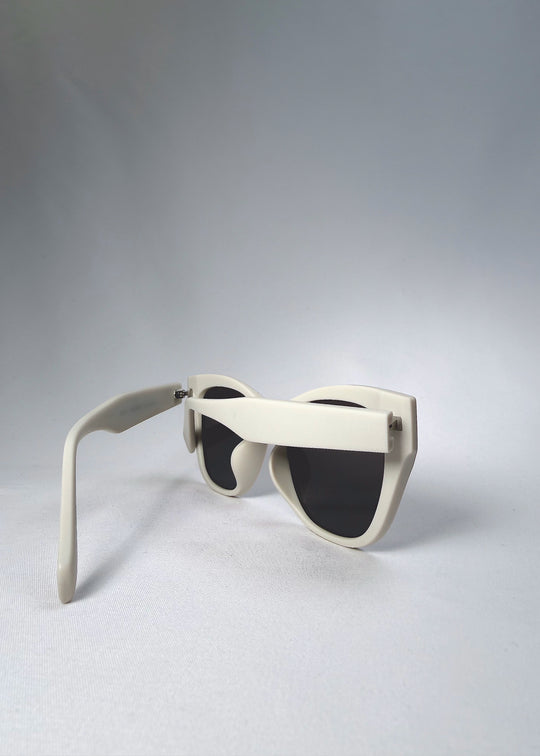 Folded view of Veyron Pale Mirage sunglasses emphasizing temple design and hinge craftsmanship.