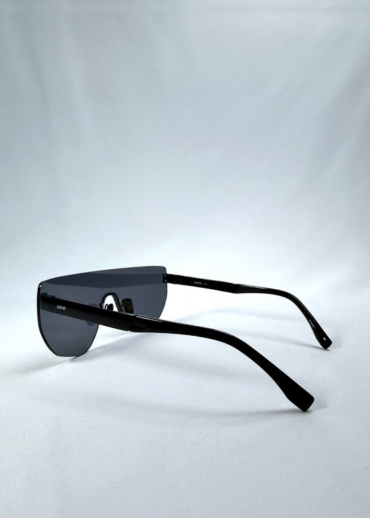 Side view of Aegis Field sunglasses in Mercury Shadow, featuring one-piece titanium shield frame and silver mirrored lens, showing the lens shape and temple profile. 