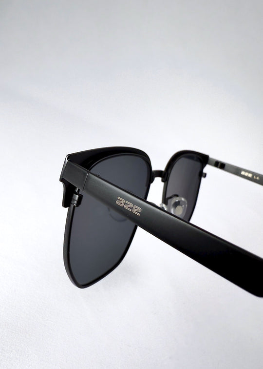 Close-up of the Altessa temple in Eclipse Black, featuring the subtle AZE logo and matte metal finish. 
