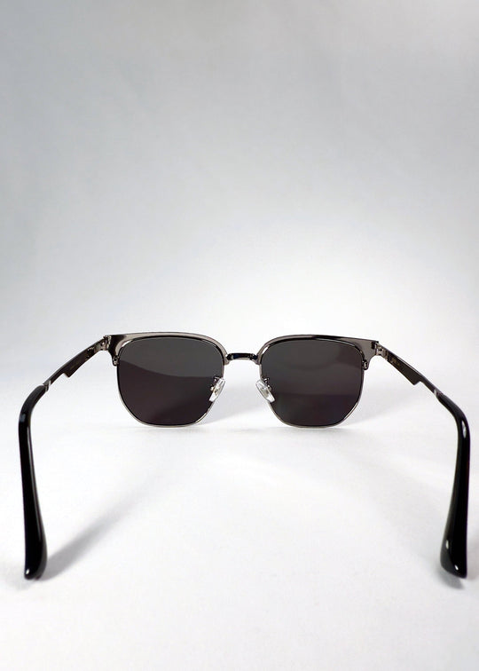 Rear view of Altessa sunglasses in Gunmetal Ash, displaying adjustable nose pads and dark lens interior. 