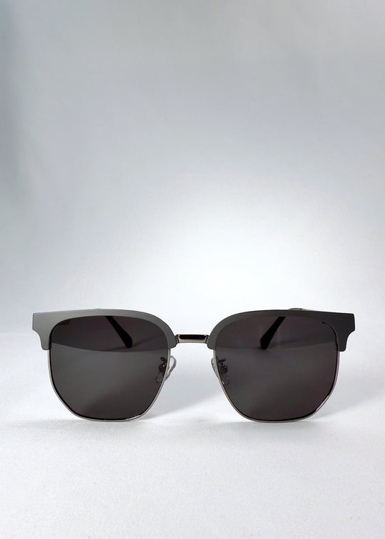 Front view of Altessa sunglasses in Gunmetal Ash, featuring a semi-rimless browline design and dark grey polarized lenses. 
