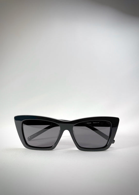 Folded view of Aquila Black sunglasses, showing the folded temples and acetate craftsmanship. 