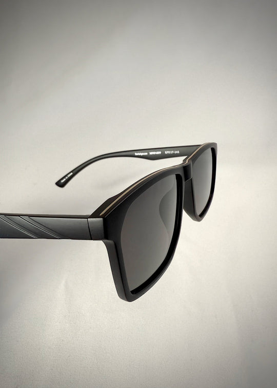 Side angle of Betelgeuse matte black TR90 sunglasses – Sleek lines and bold aesthetics. 
