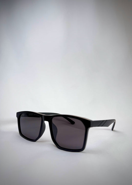 Angled view of Betelgeuse matte black sunglasses – Bold, modern, and effortlessly stylish. 