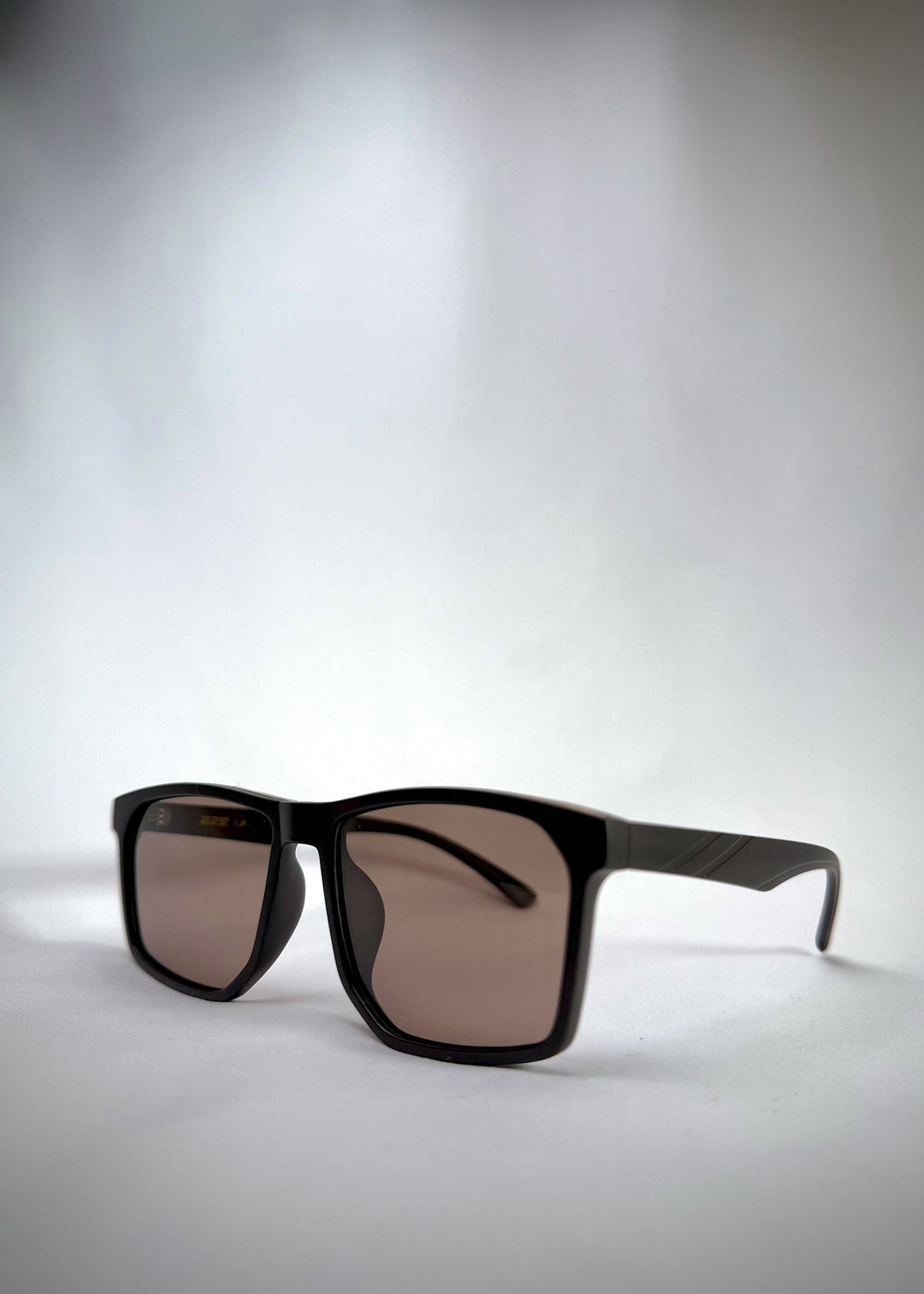 Angled view of Betelgeuse matte brown TR90 sunglasses – A blend of modern aesthetics and durability. 