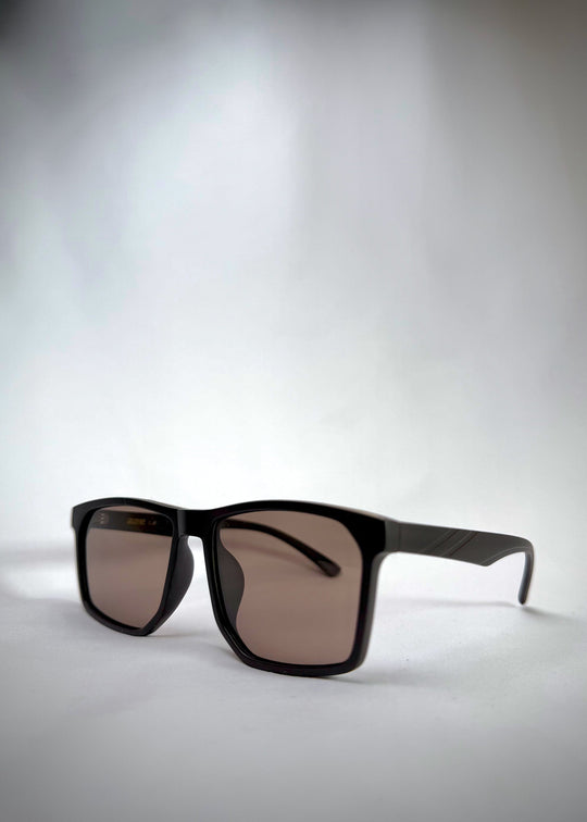 Angled view of Betelgeuse matte brown TR90 sunglasses – A blend of modern aesthetics and durability. 