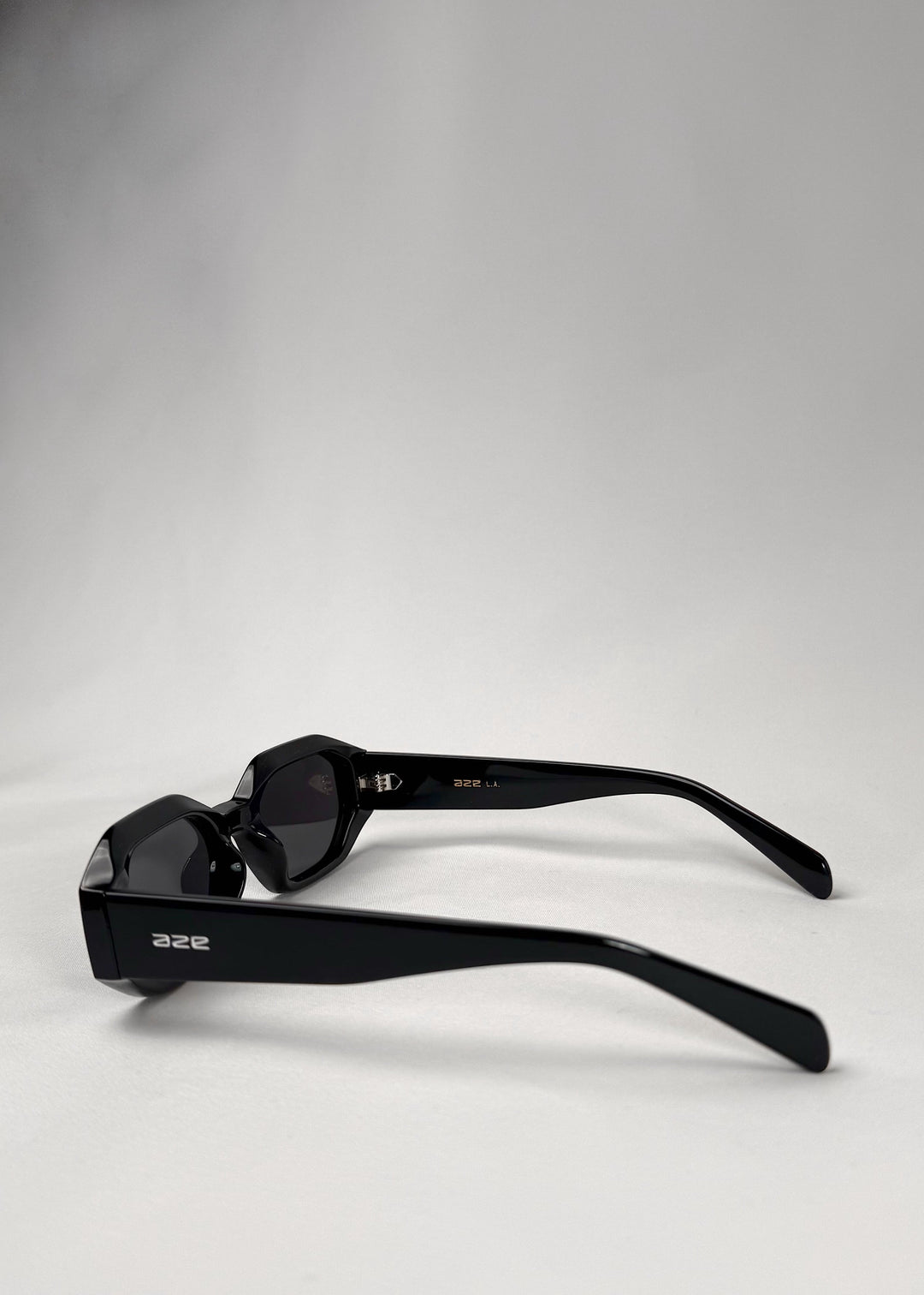 Side view of Castor - Black acetate sunglasses, highlighting the structured design and smooth temple arms. 