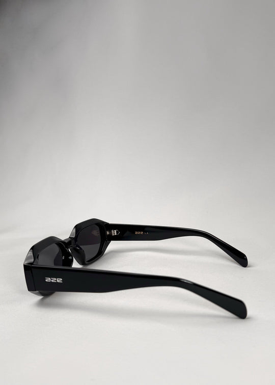 Side view of Castor - Black acetate sunglasses, highlighting the structured design and smooth temple arms. 