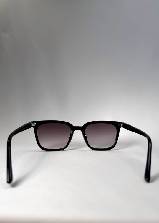 Back view of Cavalin sunglasses in Graphite Haze highlighting sturdy acetate temples and medium fit. 
