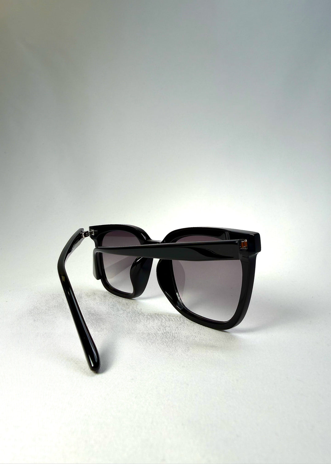 Folded angle of Cavalin Graphite Haze showing hinge design and clean inner frame details. 