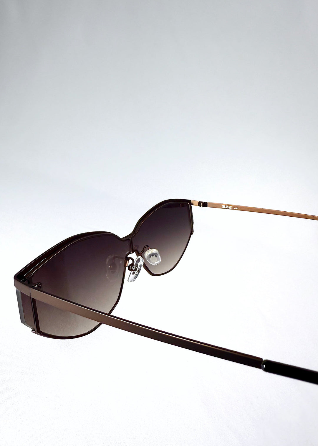 Detailed view of the hinge and semi-rimless front frame construction of Celestia – Ash Fade. 