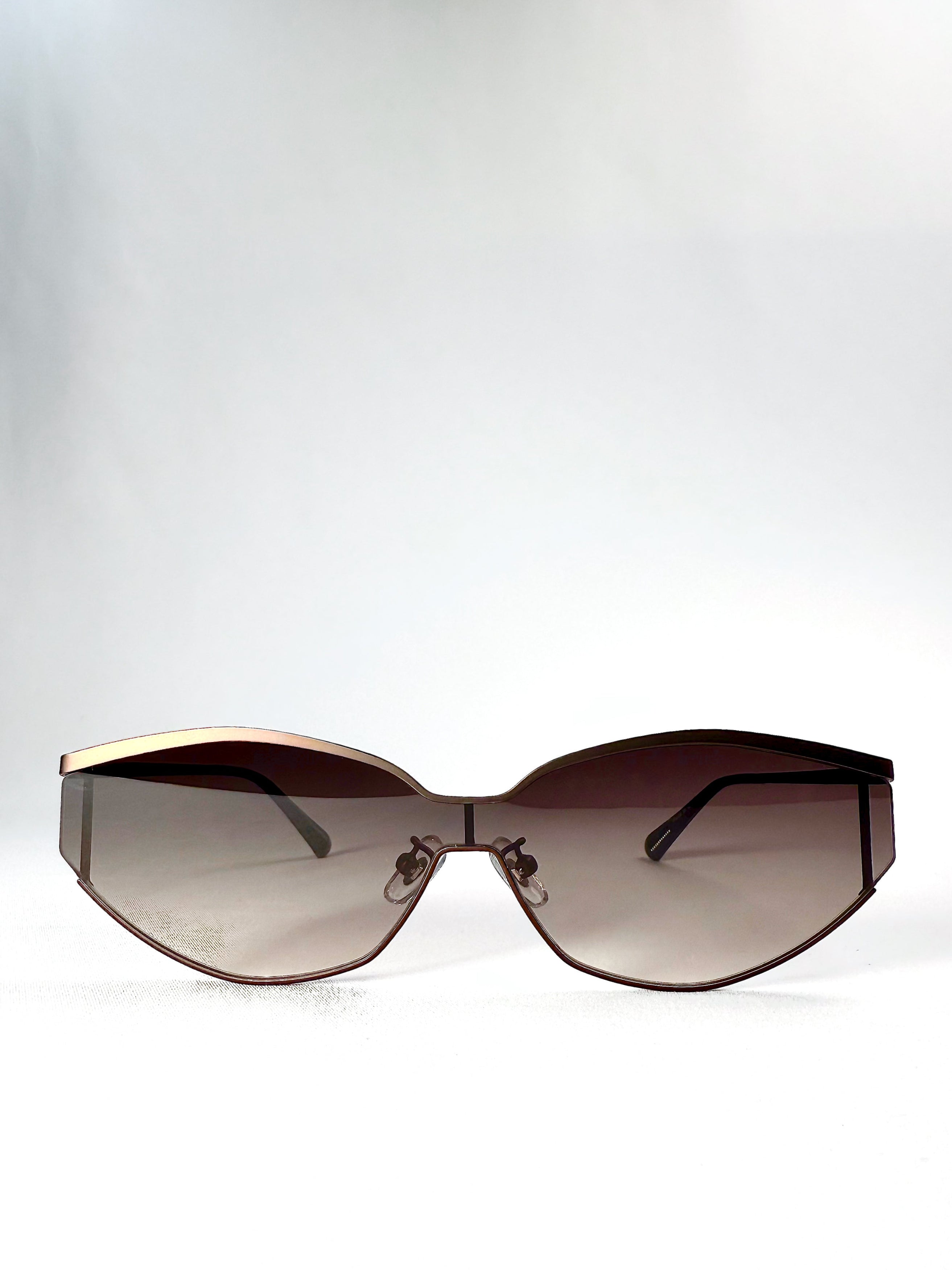 Front view of Celestia – Ash Fade sunglasses showcasing the gradient lenses and semi-rimless frame design.