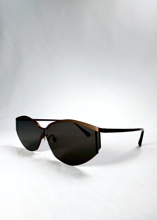 Front angle view of Celestia – Mocha Bronze highlighting the bronzed stainless steel frame and subtle lens curvature. 