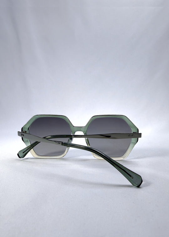 Folded back view of Ciel Arc sunglasses in Jade Phase, featuring green-toned frame and smoky green lenses, showing the folded temples and back structure.