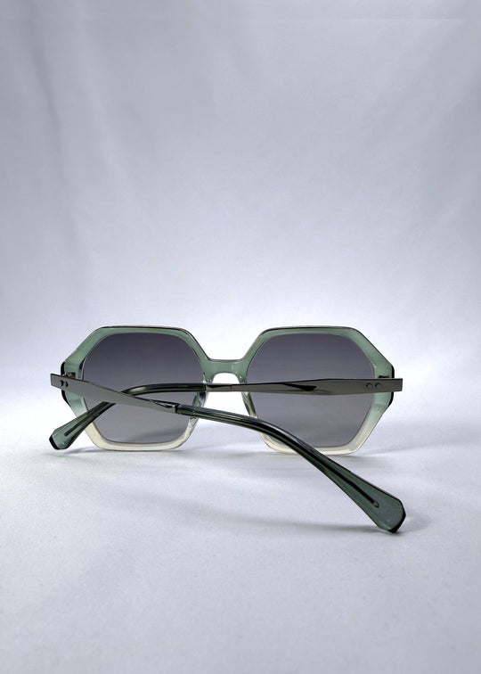 Folded back view of Ciel Arc sunglasses in Jade Phase, featuring green-toned frame and smoky green lenses, showing the folded temples and back structure. 