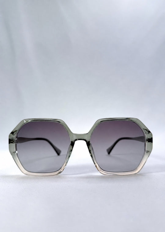 Front view of Ciel Arc sunglasses in Jade Phase, featuring green-toned frame and smoky green lenses, showing the full front silhouette.