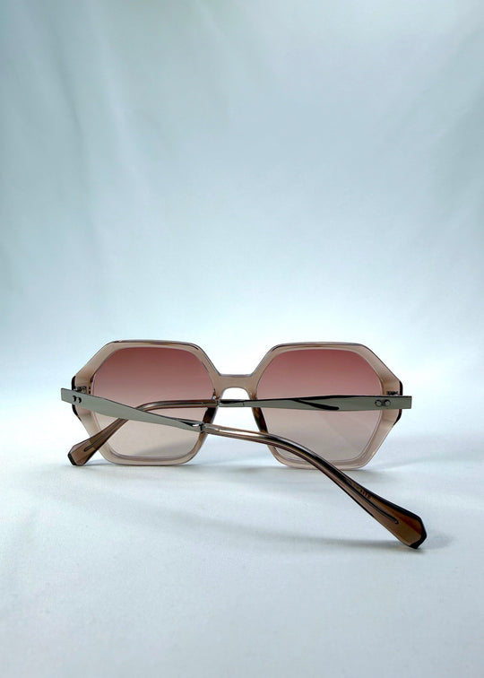Folded back view of Ciel Arc sunglasses in Mocha Bronze, featuring mocha bronze frame and warm brown gradient lenses, showing the folded temples and back structure. 