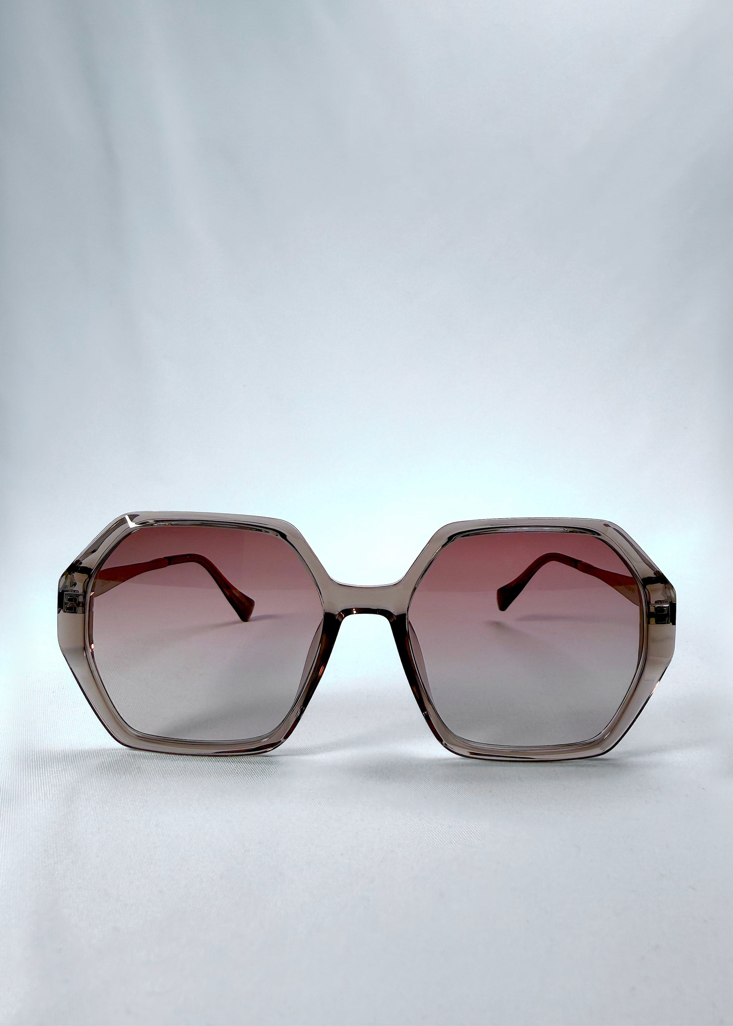 Front view of Ciel Arc sunglasses in Mocha Bronze, featuring mocha bronze frame and warm brown gradient lenses, showing the full front silhouette.