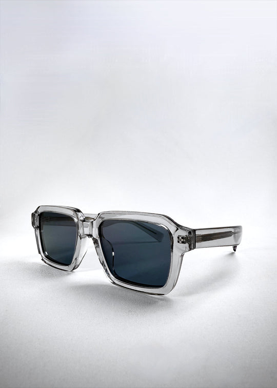 Angled right-side view of Crest - Glacier sunglasses, revealing the clean silhouette and frosted crystal acetate finish. 