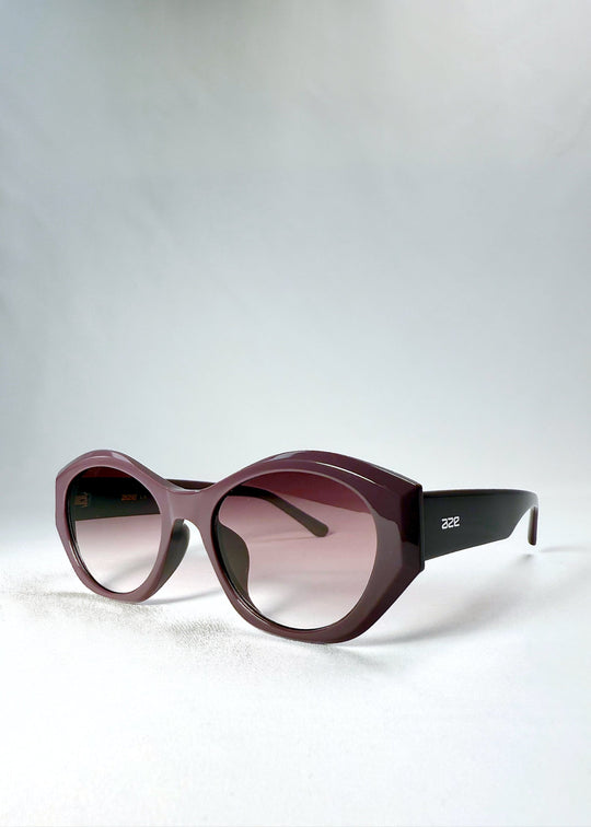 Front-angle view of Eclipse Feline - Twilight Plum sunglasses, showing deep plum acetate frame and violet gradient lenses. 