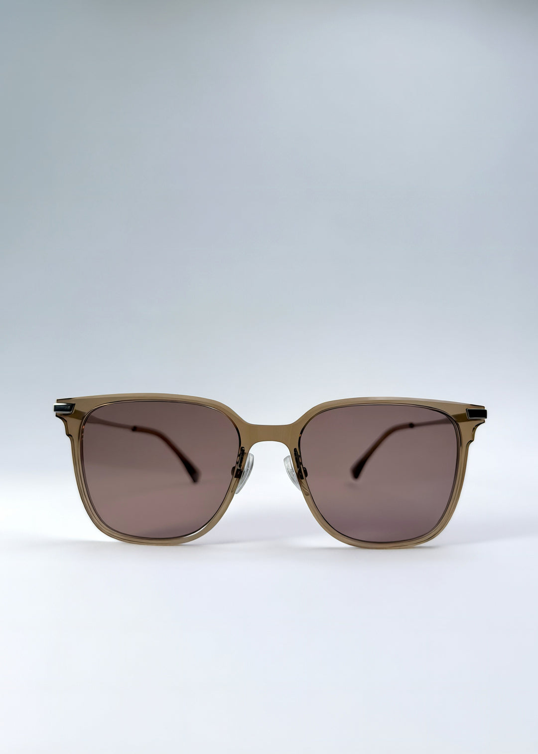 Front view of Eon Drift sunglasses in Mocha Bronze, featuring a warm mocha frame, bronze-tone accents, and brown gradient lenses, showing the full front silhouette.