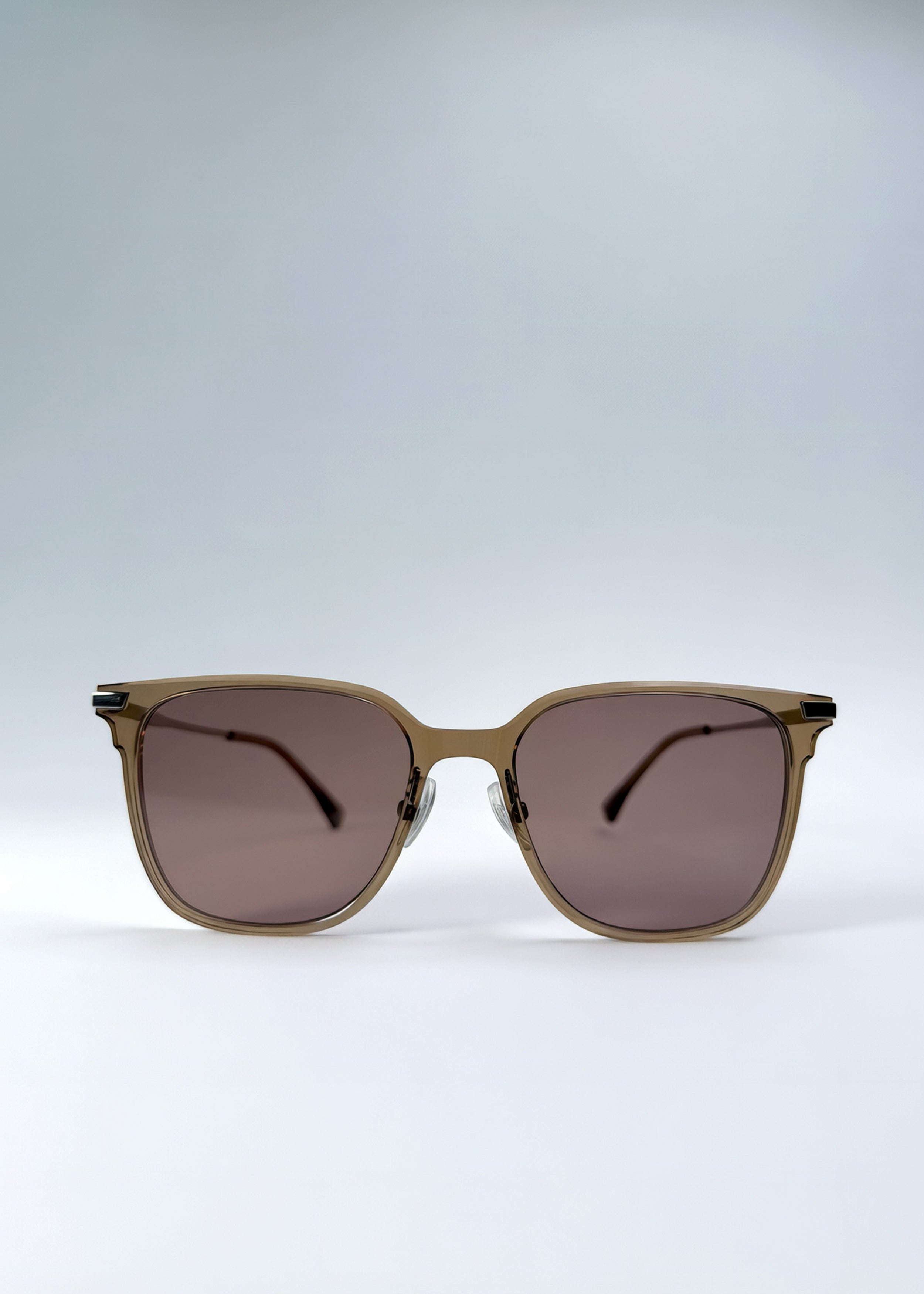 Front view of Eon Drift sunglasses in Mocha Bronze, featuring a warm mocha frame, bronze-tone accents, and brown gradient lenses, showing the full front silhouette.