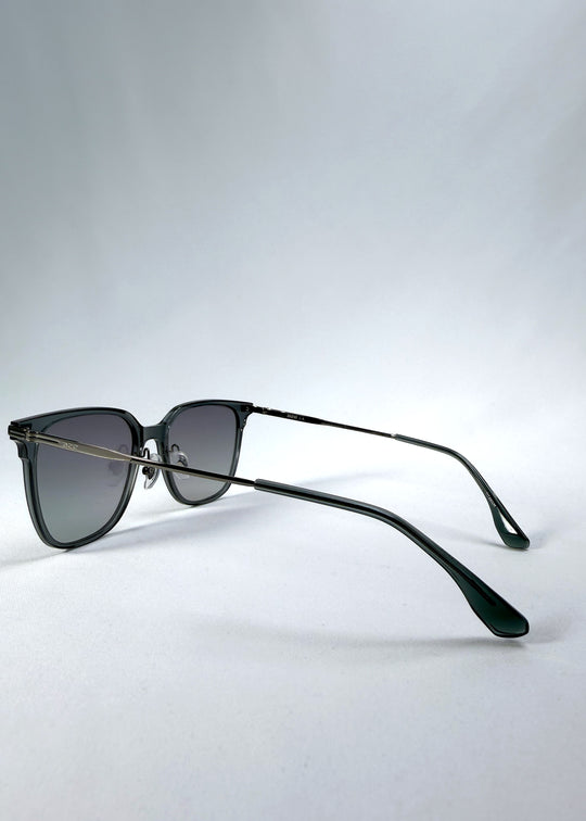 Back-angle view of Eon Drift sunglasses in Onyx Fade, featuring a dark onyx frame and gray gradient lenses, showing the rear frame structure and temple alignment.