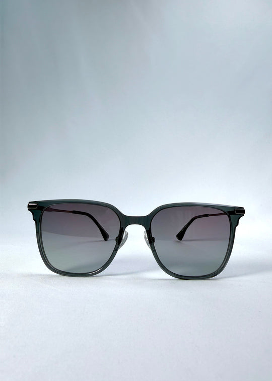 Front view of Eon Drift sunglasses in Onyx Fade, featuring a dark onyx frame and gray gradient lenses, showing the full front silhouette.