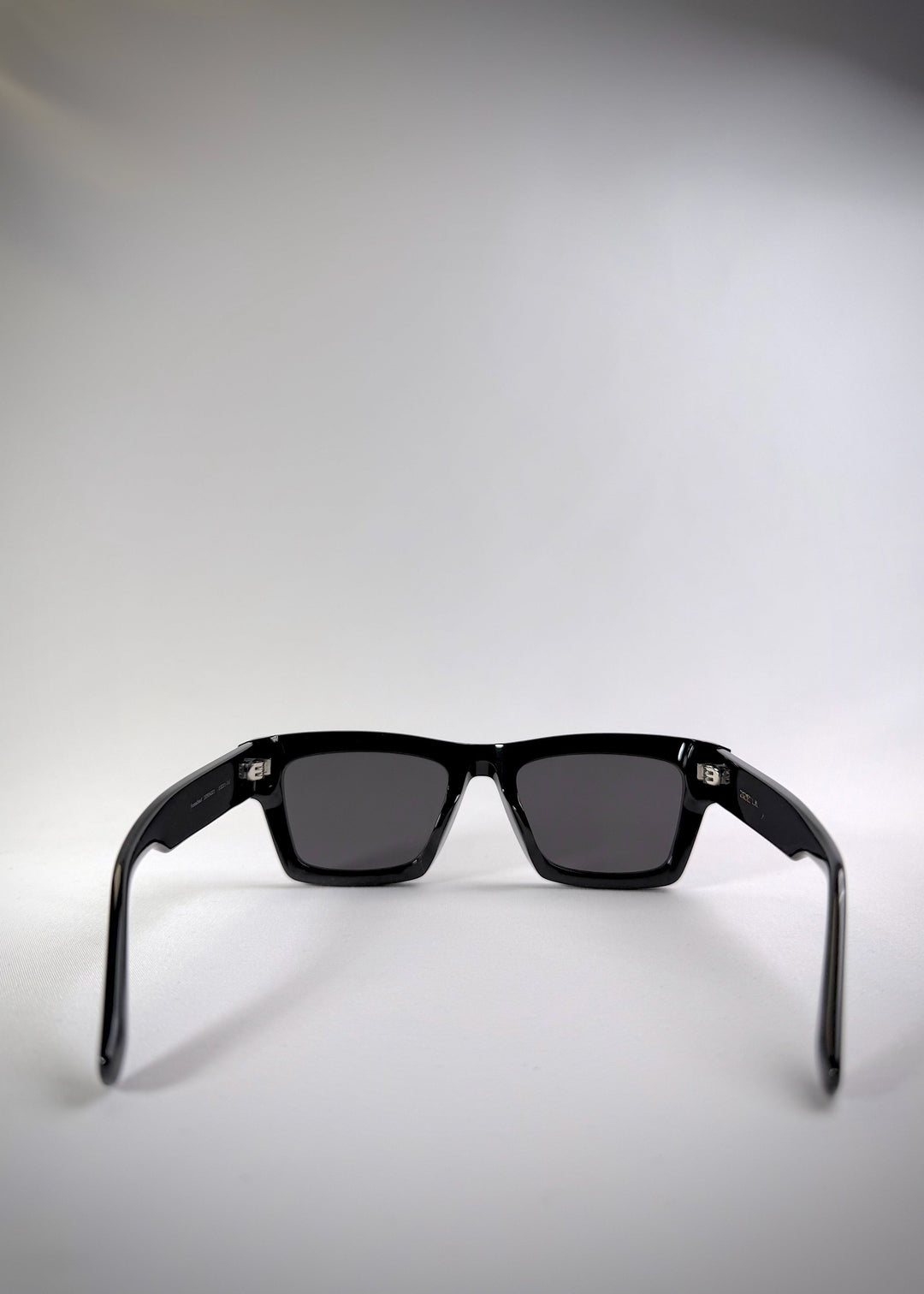 Back view of Fomalhaut black acetate prescription sunglasses, showing the inner temple design and overall fit. 