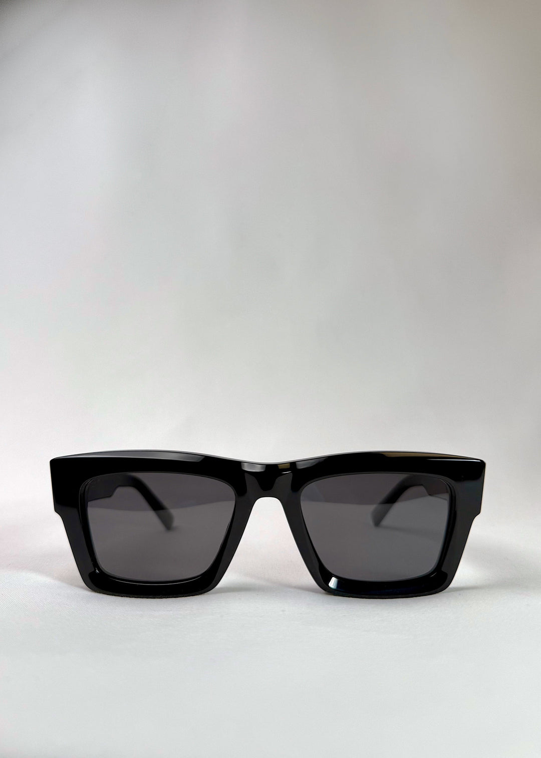 Front view of Fomalhaut black acetate prescription sunglasses with UV400 polarized lenses. 