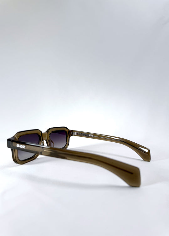 Back-angle view of Havoc in Ember Fade, showing the smooth olive acetate temples and embedded AZE branding. 
