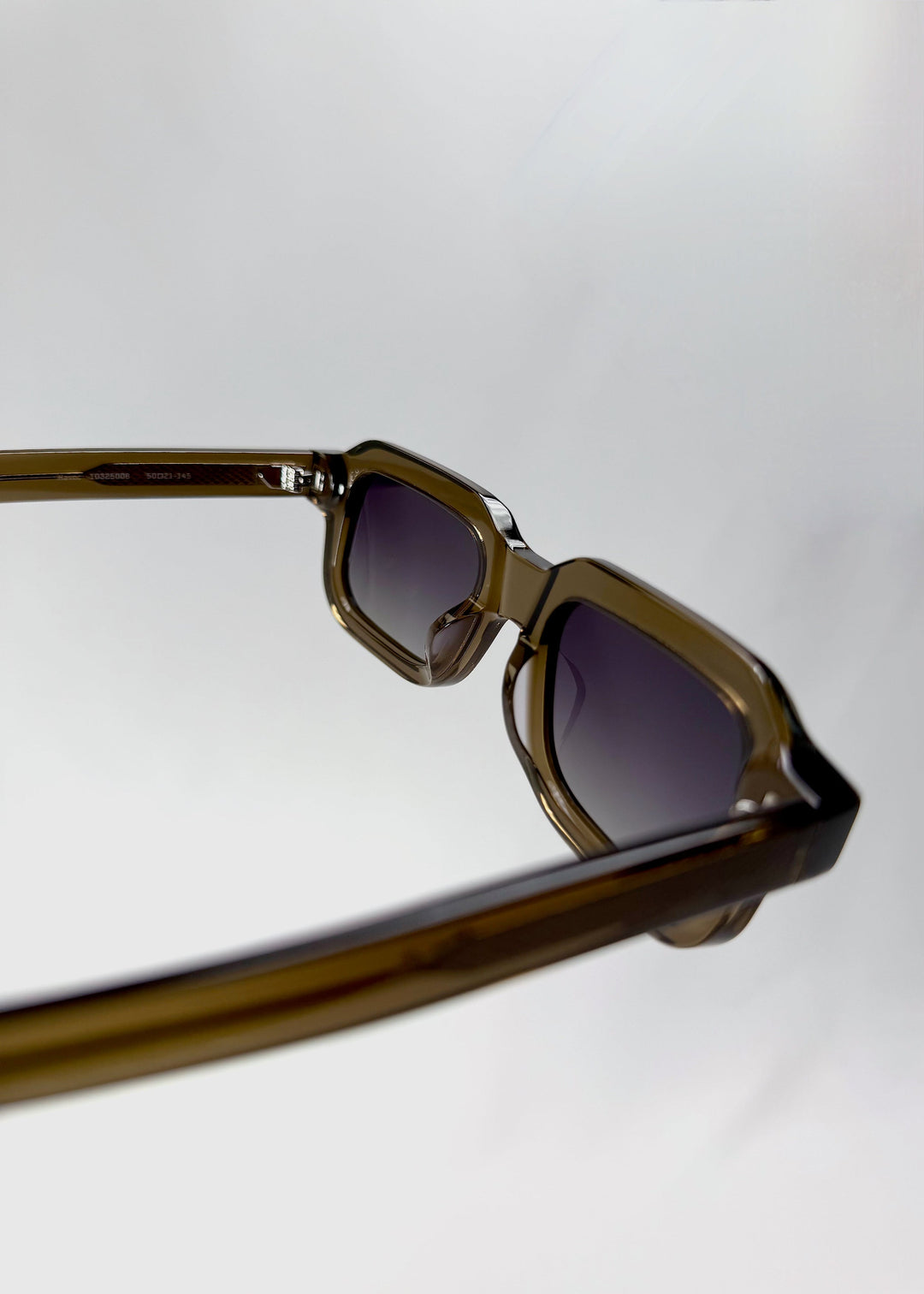 Close-up of the inner temple of Havoc in Ember Fade, showing the model and size markings. 
