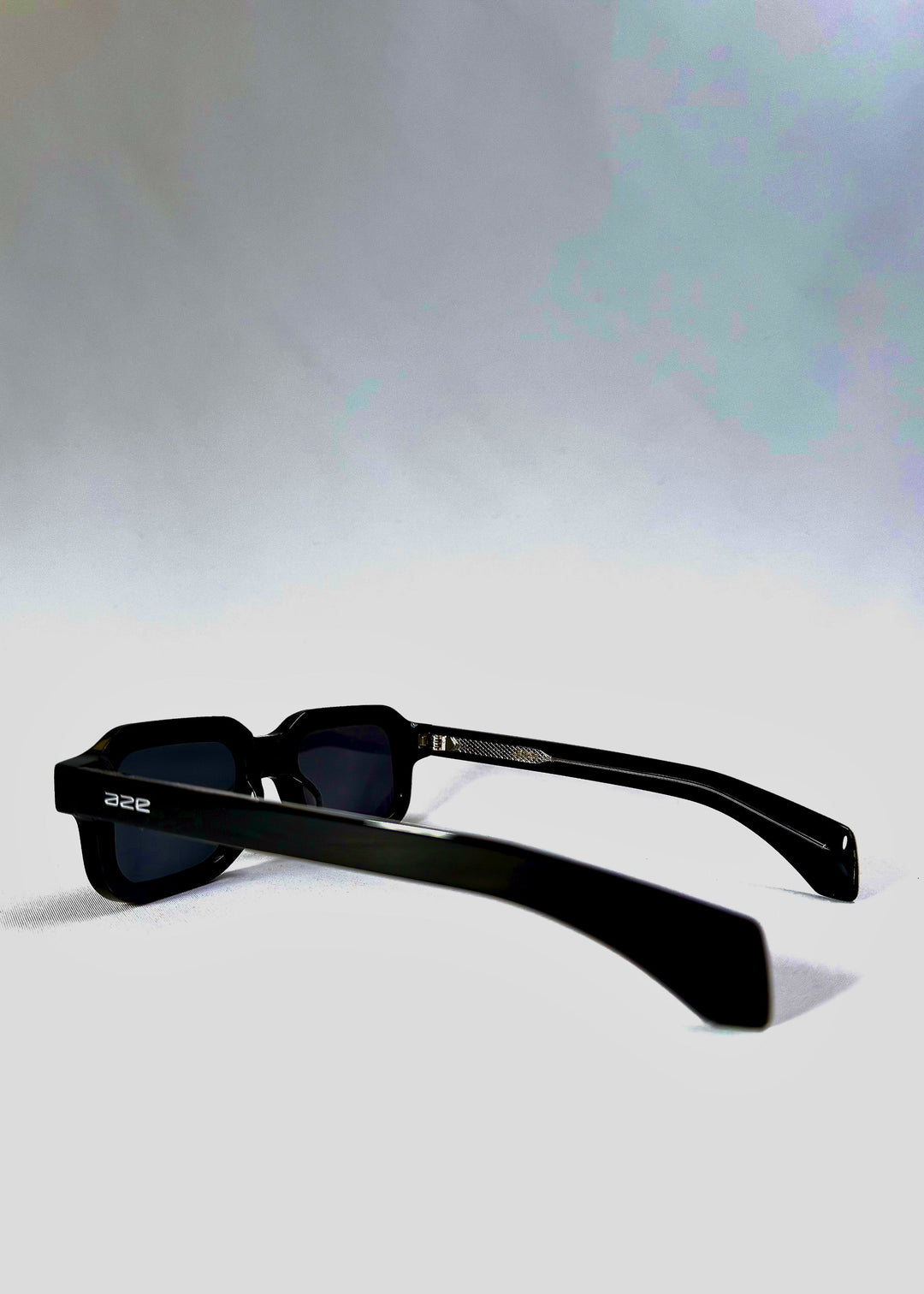 Rear angle view of Havoc in Obsidian Black, showcasing the bold temple arms and matte black acetate texture. 