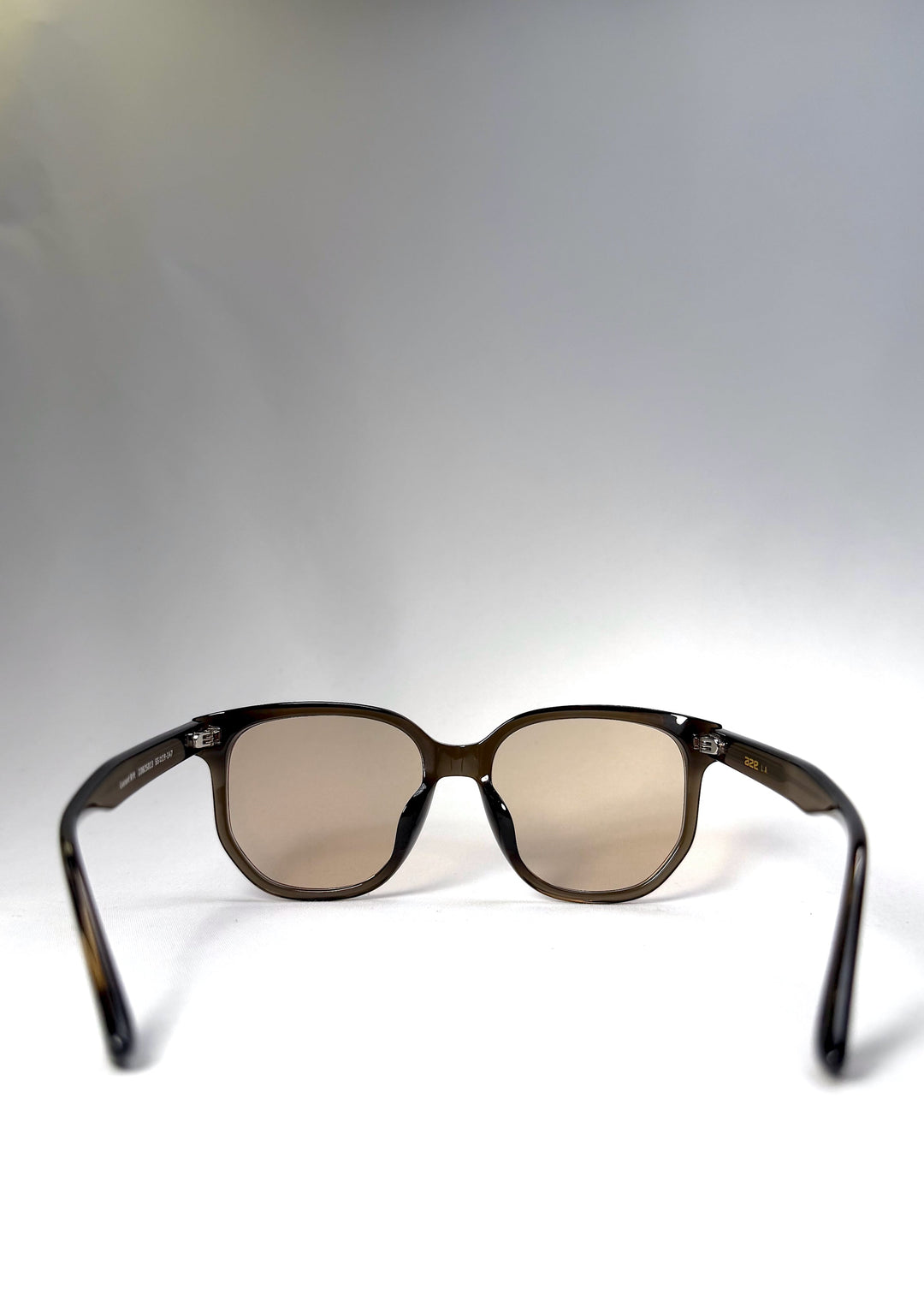 Back view of Lucent Rift in Sepia Veil showing the inner frame contour and arm curvature. 