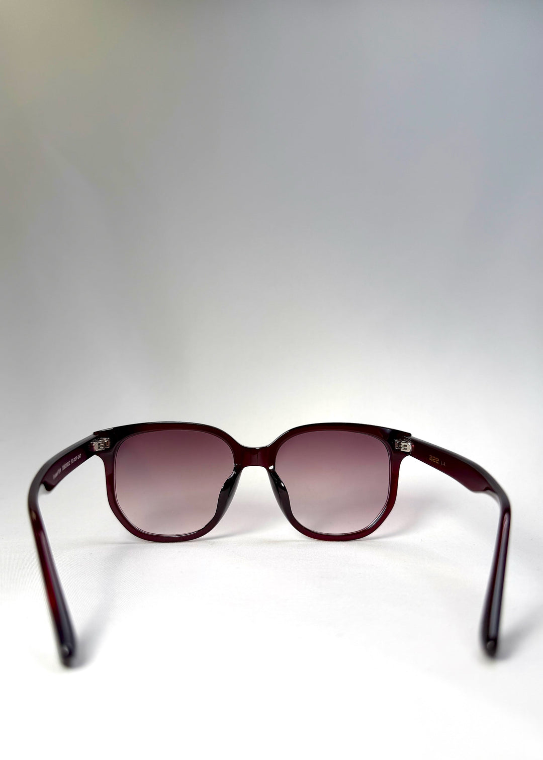 Back view of Lucent Rift in Velvet Eclipse showing the inner frame contour and arm curvature. 
