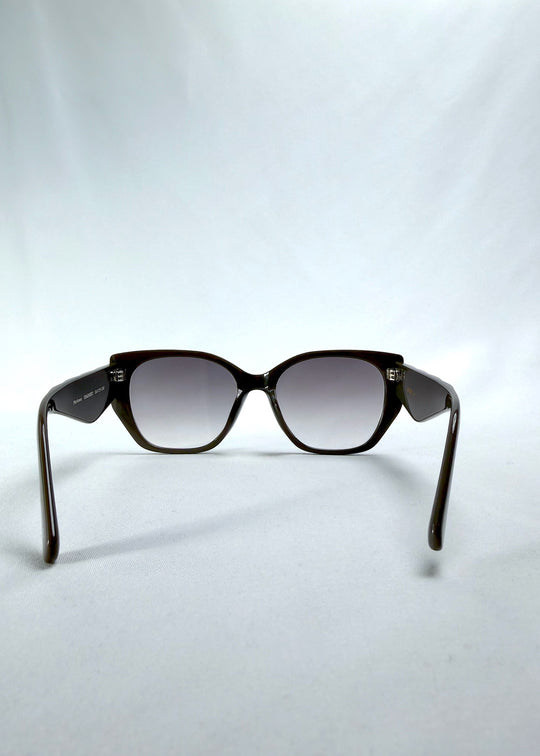 Back view of Marlowe sunglasses in Graphite Haze, featuring grey-brown acetate frame and smoky lenses, showing the inside frame and open temples.