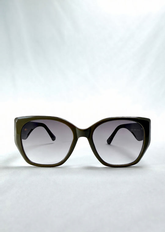 Front view of Marlowe sunglasses in Graphite Haze, featuring grey-brown acetate frame and smoky lenses, showing the full front silhouette.