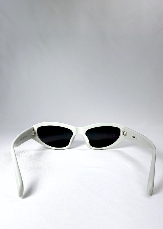 Back view of Nebula Shade sunglasses in Glacial Ash, showing the inner frame curvature and fixed nose bridge. 