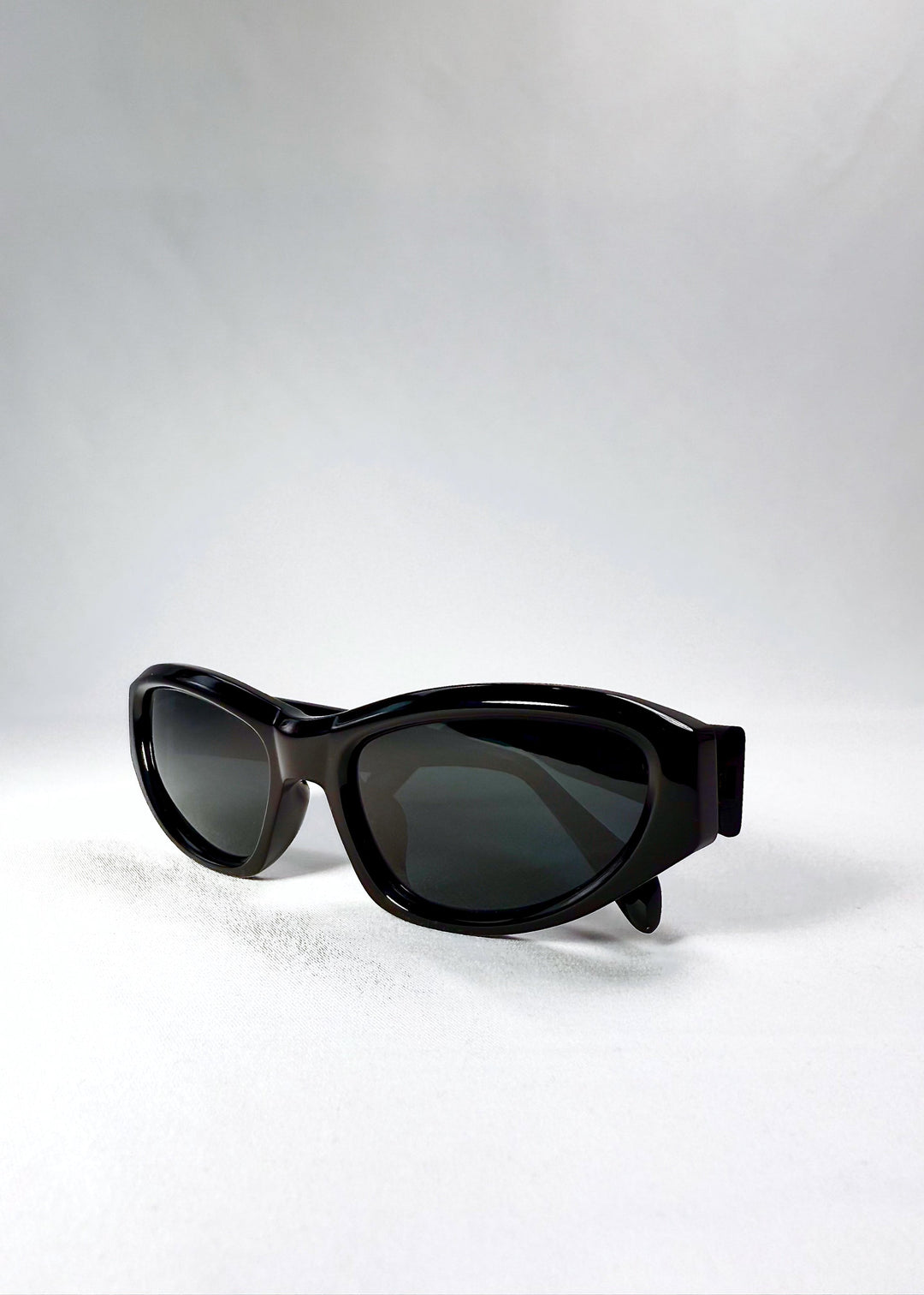 Closeup detail of the thick acetate frame of Nebula Shade - Obsidian Black with sculpted edges. 