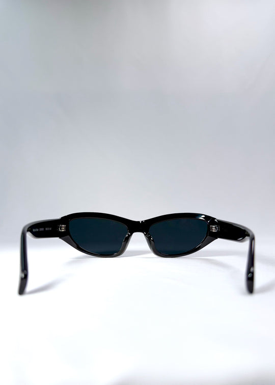 Inside view of Nebula Shade - Obsidian Black revealing frame curvature and fixed nose bridge design. 