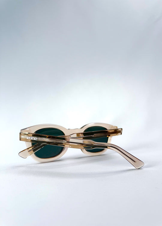 Back view of Phantom Verge in Champagne Moss, revealing the curved temples designed for a snug, comfortable fit. 