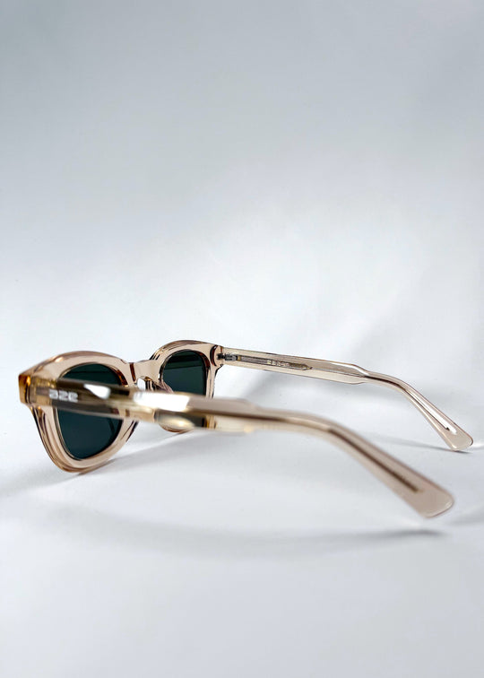 Side view of Phantom Verge in Champagne Moss, showcasing the slim temple arms and subtle logo detailing. 